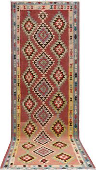 A kurdish kilim carpet, Western Iran, c 323 x 113 cm.