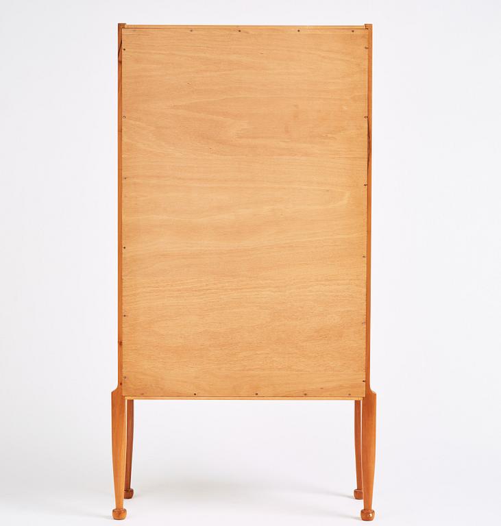 Josef Frank, a walnut showcase cabinet, Svenskt Tenn, Sweden, model B 2217, probably 1950s.