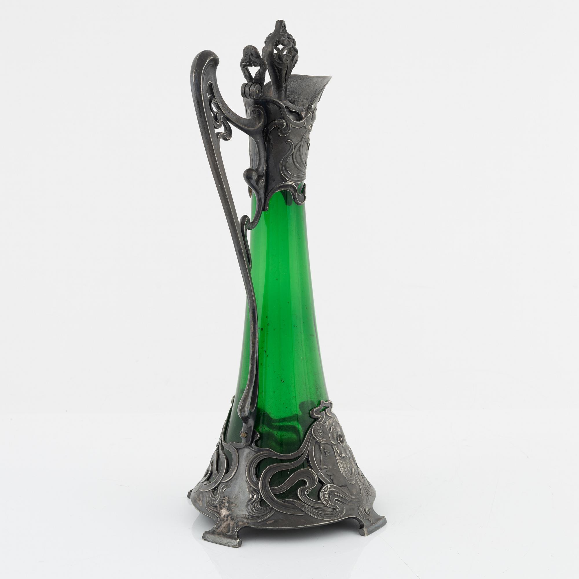 A silver plate and glass decanter, Art Nouveau, early 20th century.