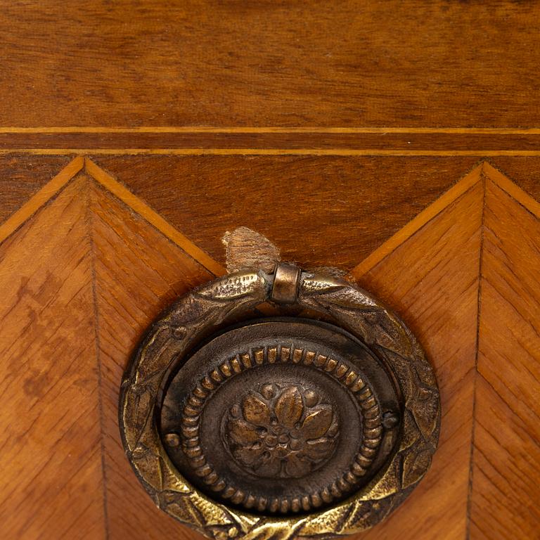 A Louis XVI style chest of drawers, France, circa 1900.