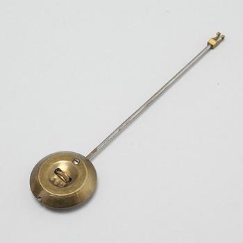 A table clock and two candelabras, around the year 1900.