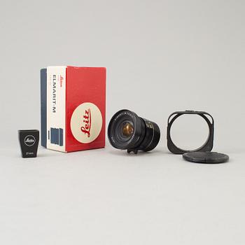 A black Leica Elmarit -M 1:2.8/21 no 3211824 from Leitz Canada with viewfinder and original box.