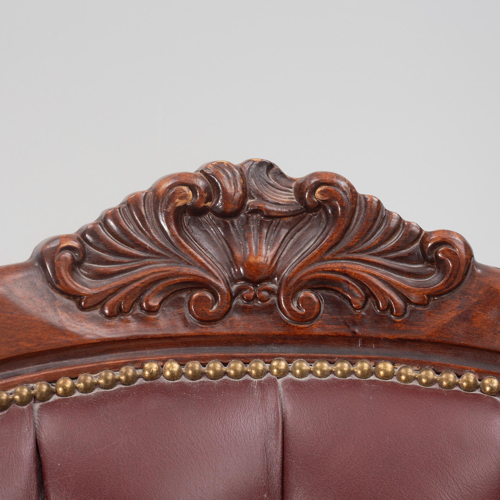 A Rococo style armchair, second half of the 20th century.