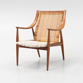 Peter Hvidt & Orla Mølgaard Nielsen, an 'FD 146' teak and rattan easy chair, France & Son, Denmark.