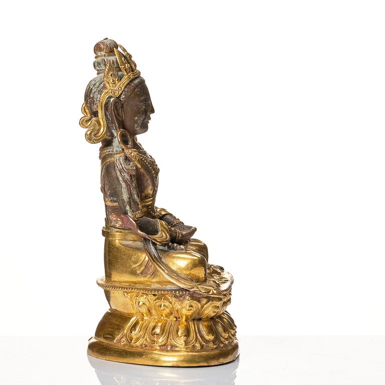 A Mongolian, partly gilt reoussé sculpture of Amitayus, 19th Century.