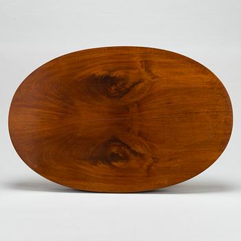 A Late Empire table, 1820s-1830s.