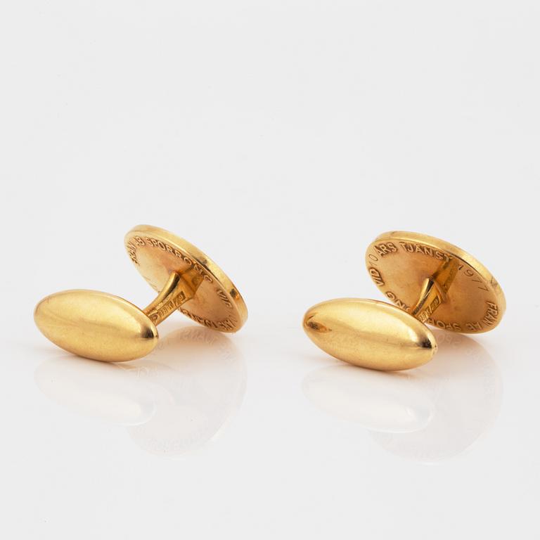 MANSCHETTKNAPPAR, Sporrong, 18K guld.