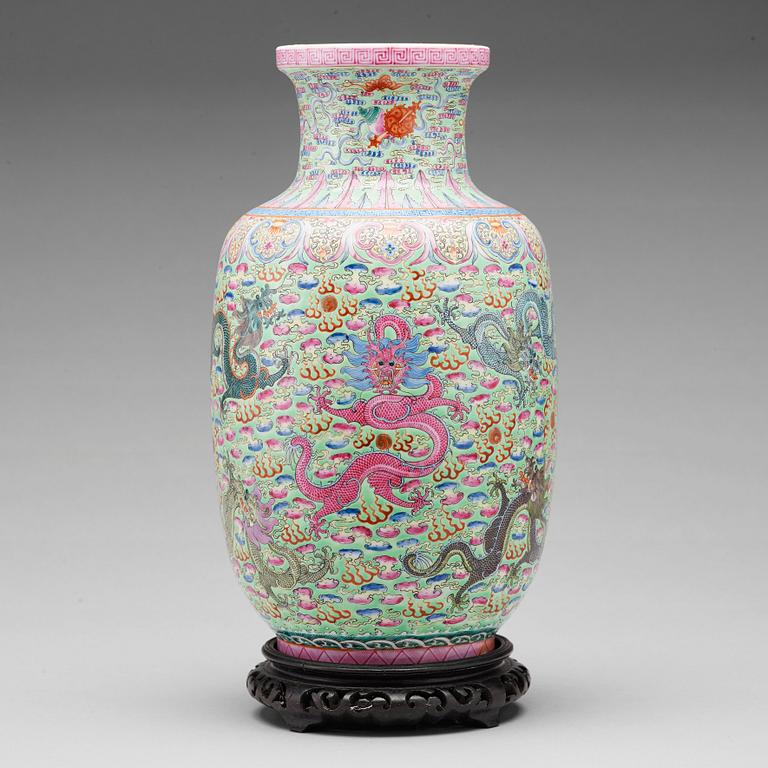 A famille rose and green ground vase, Republic (1912-49), with Qianlong six character mark.