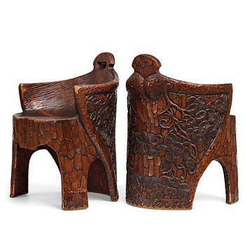 234. Gustaf Fjaestad, a pair of Art Nouveau carved pine chairs "stabbestolar", Arvika Sweden 1908-09.