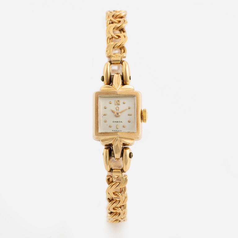 Gold Omega ladies watch.