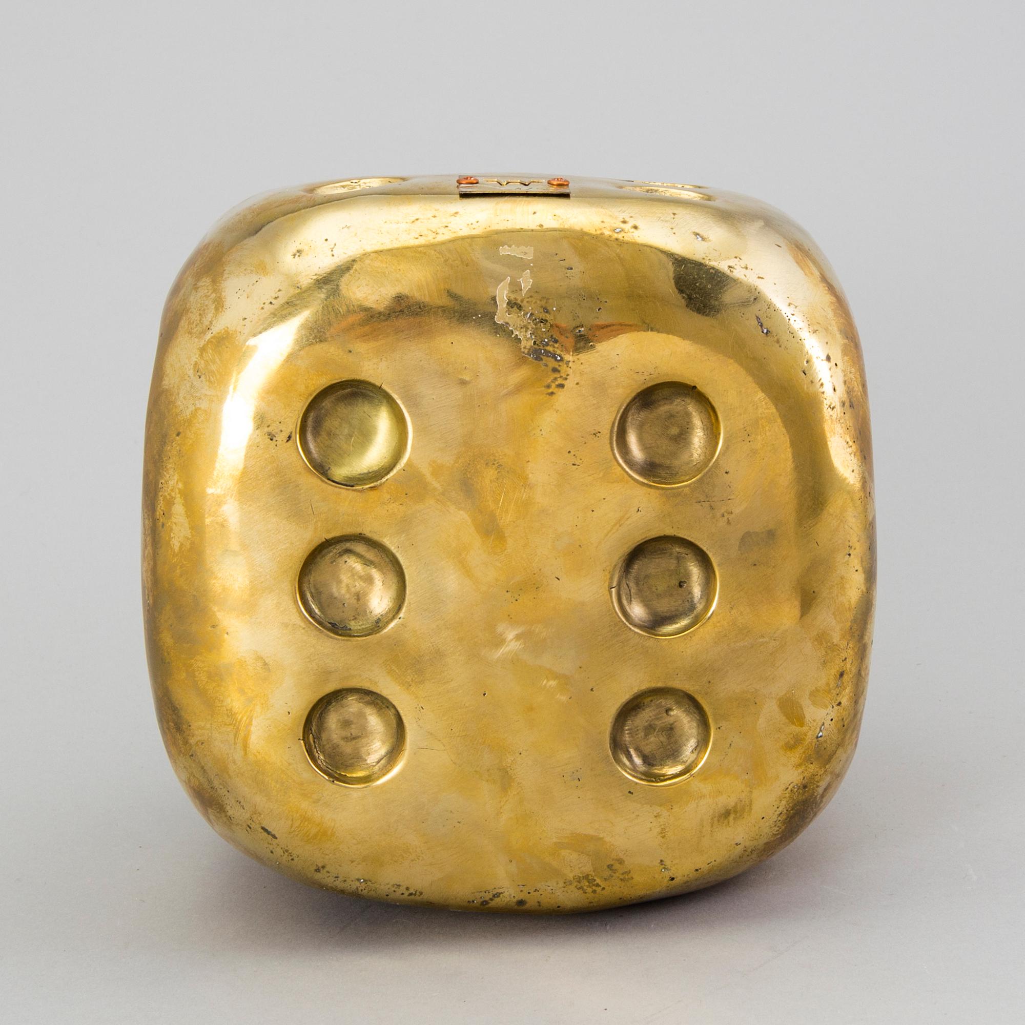 A brass sculpture by Andreas Wargenbrant, signed and numbered 4/50.