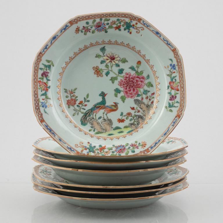 A set of seven (3+4) famille rose 'double peacock' plates, Qing dynasty, Qianlong (1736-95).