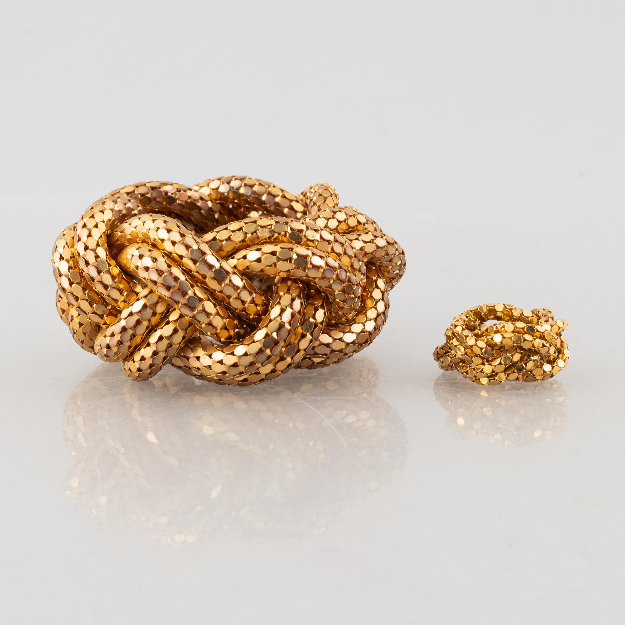 Lara Bohinc, a set of a necklace, ring, and bracelet.