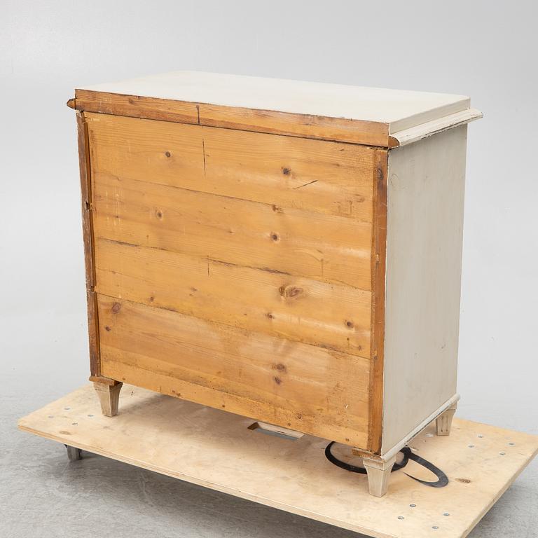 A chest of drawers, around 1900.
