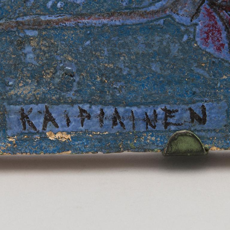 A stoneware plaquet signed Kaipiainen.