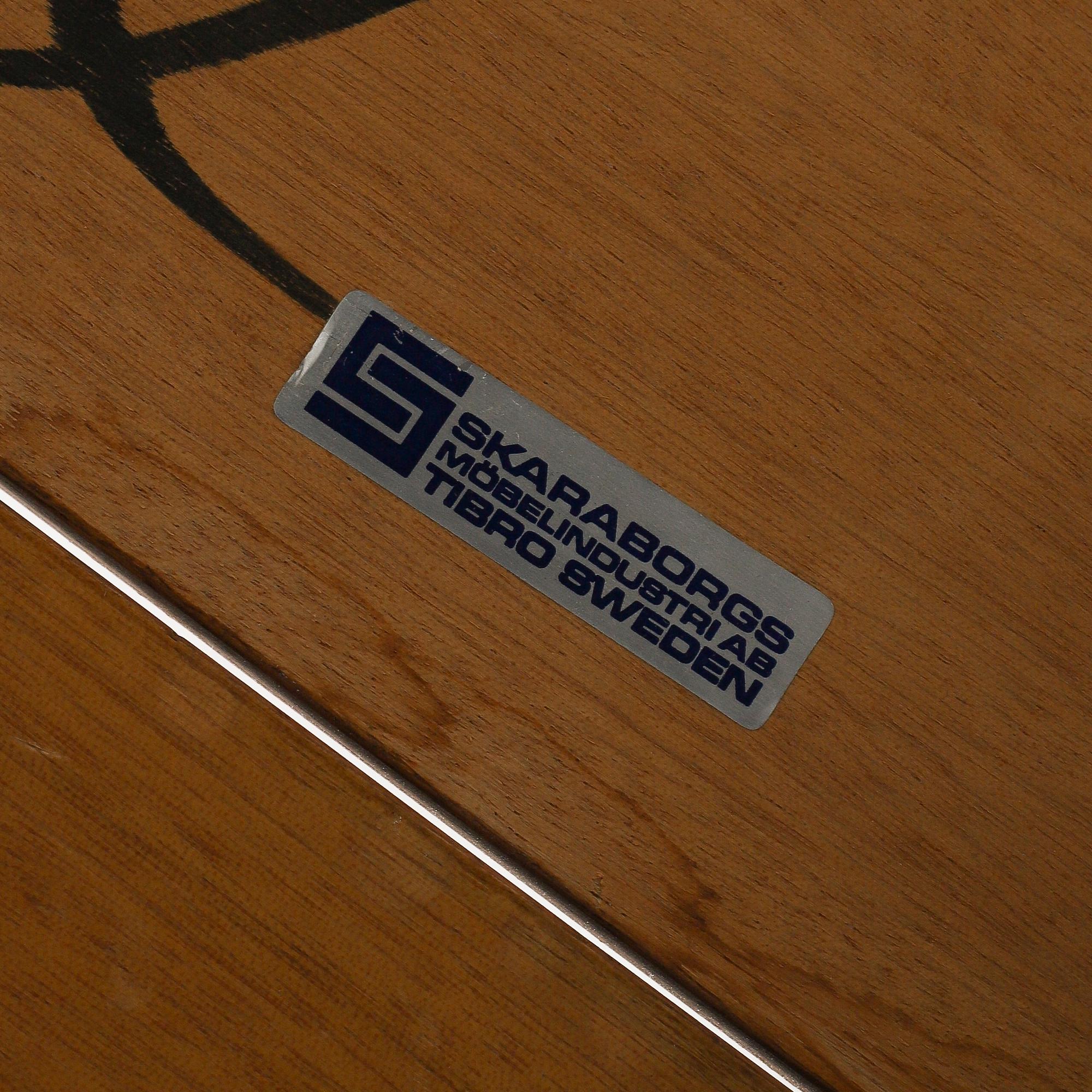 A walnut dining table from Skaraborgs Möbelindustri AB, Tibro, second half of the 20th Century.