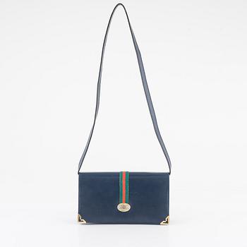 Gucci, a handbag.