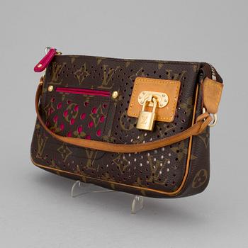 A Louis Vuitton hand bag.