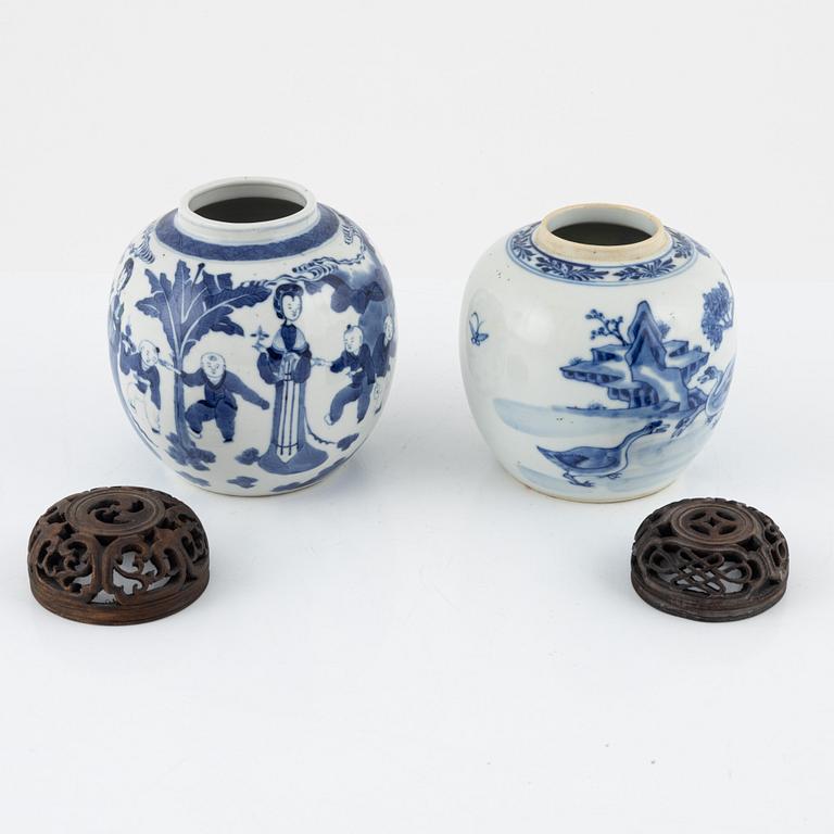 Two similar blue and white lidded urns, China, 19th century.