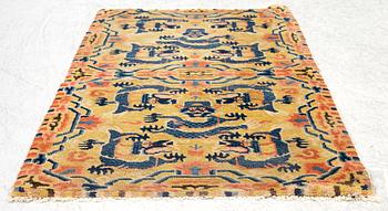 A Chinese antique Ningxia rug, late Qing dynasty, c. 128 x 67 cm.