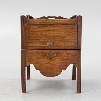 A mahogany bedside table, England, around 1900.