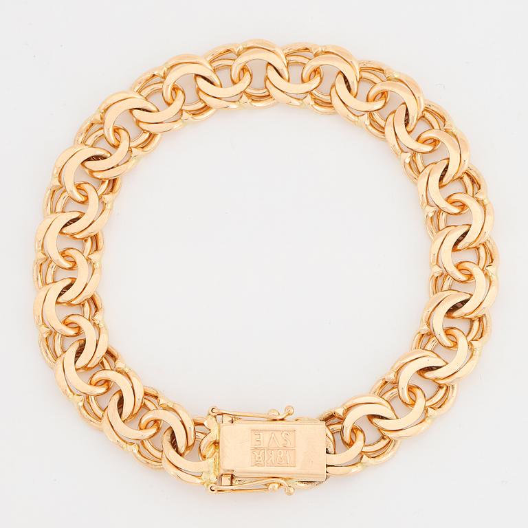An 18K gold bracelet, Bismarck link.