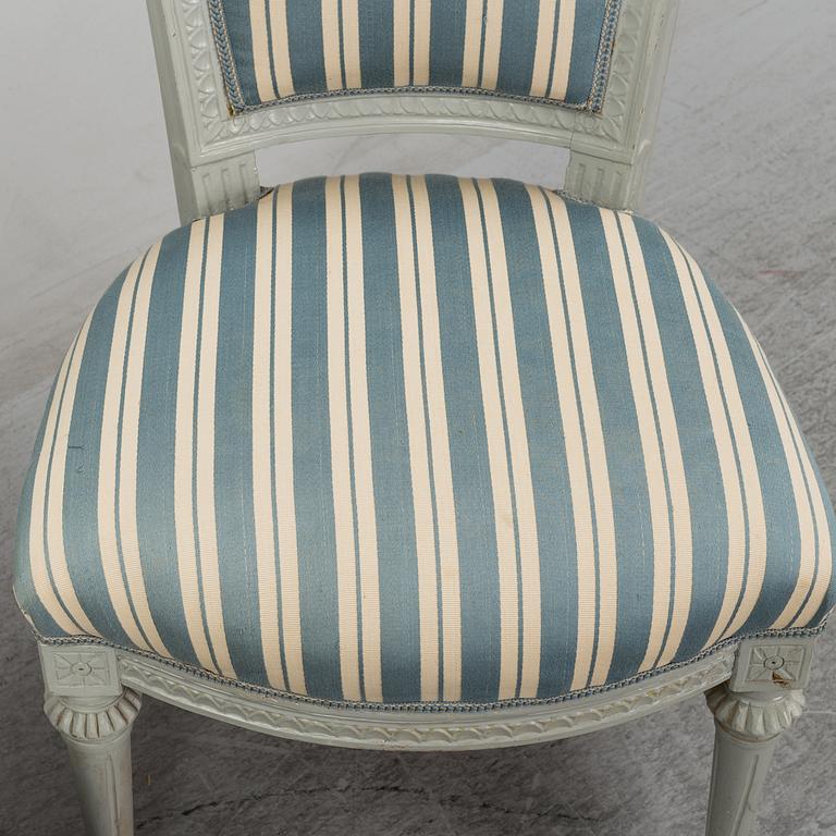 Six (3+2+1) late 18th century Gustavian chairs.