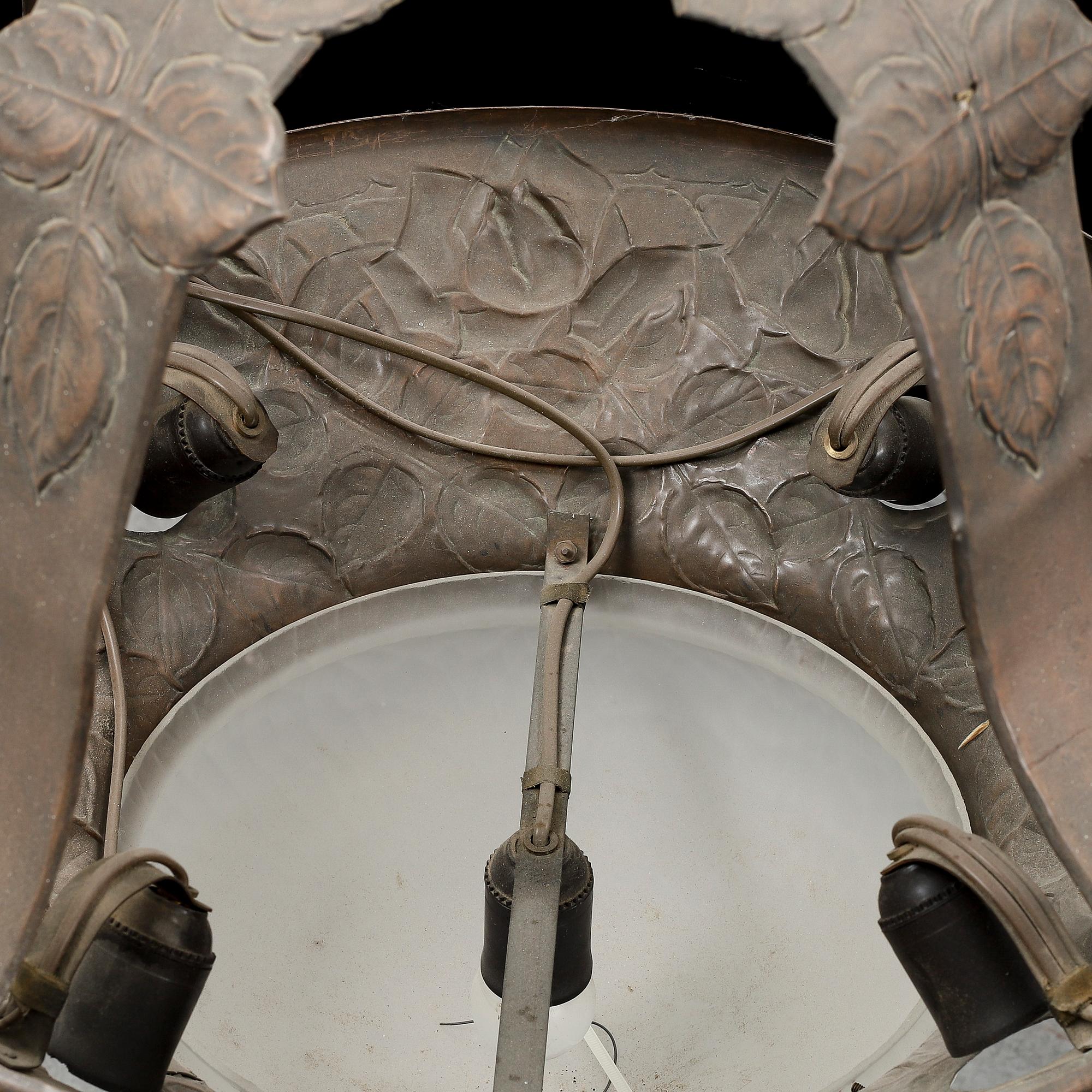 An early 20th Century art noveau copper ceiling light.