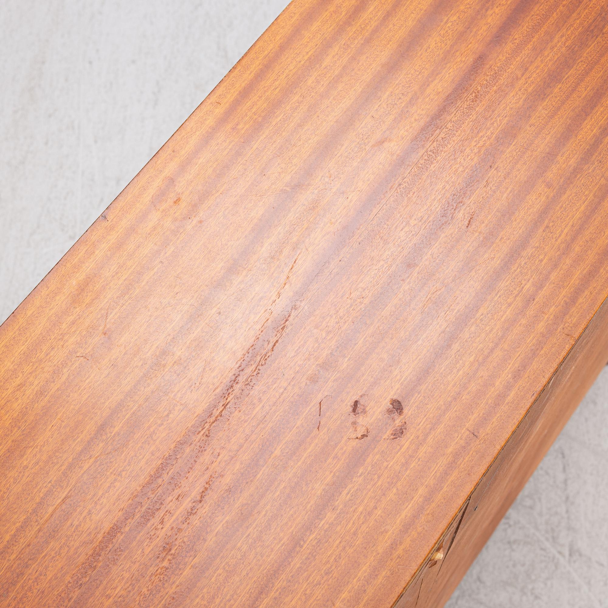 A ahogany-veneered 1940's/50's bookcase.