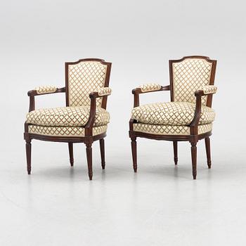 A Pair of Louis XVI Style Armchairs, 20th Century.