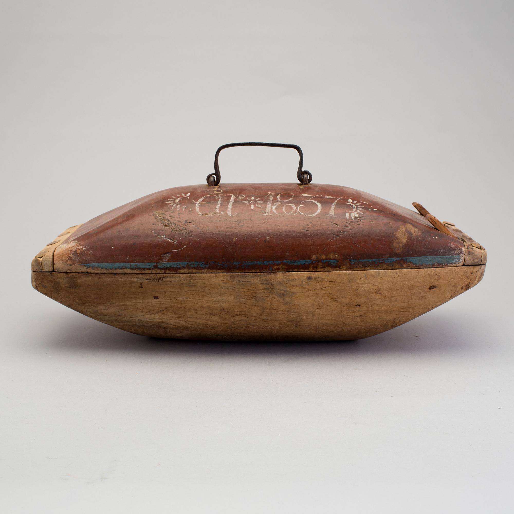 A painted folk art trough dated 1837.