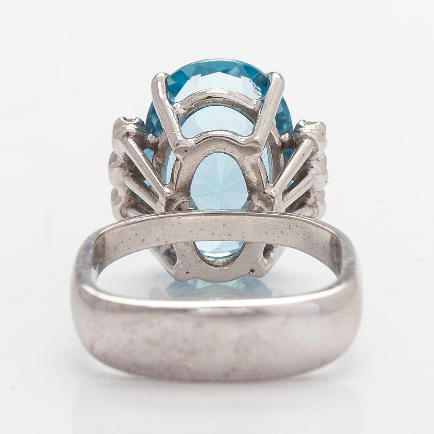 An 18K white gold ring with aquamarine and brilliant-cut diamonds, Conti, South Africa.