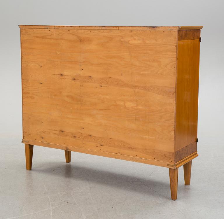 A elm and burr birch veneered Swedish Modern cabinet, 1930's/40's.