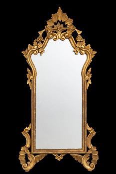 An mid 20th century Louis XV-style mirror from Paoletti, Firenze Italy.