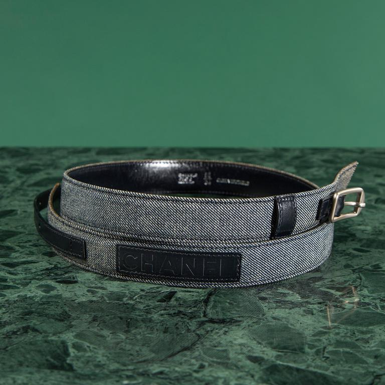 A belt and three bows, by CHANEL.