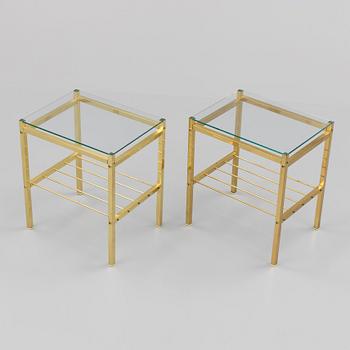 A pair of brass and glass tables, second half of the 20th century.