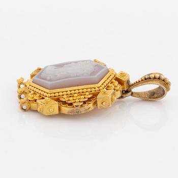 A 19th century 14K gold pendant with a hardstone cameo.