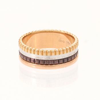 A “Quatre” ring in 18K yellow, pink, white gold and brown PVD by Boucheron.
