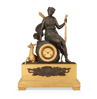 548. A French Empire early 19th century mantel clock.