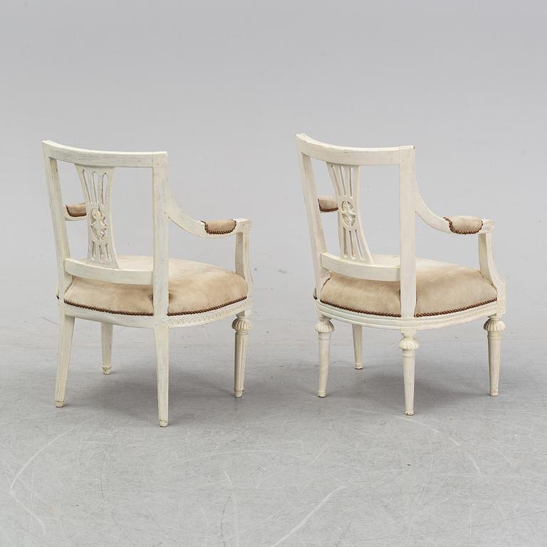 A set of two Gustavian arm chairs from the early 19th Century.