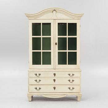 A Rococo style vitrine cabinet, 19th century.
