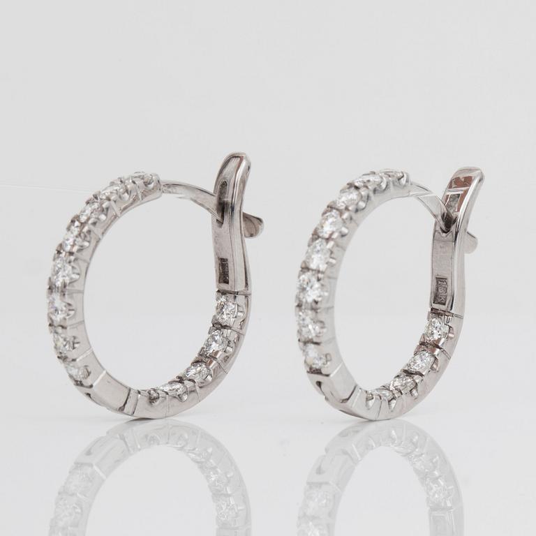 A pair of brilliant-cut diamond hoop earrings. Total carat weight circa 1.50 cts.