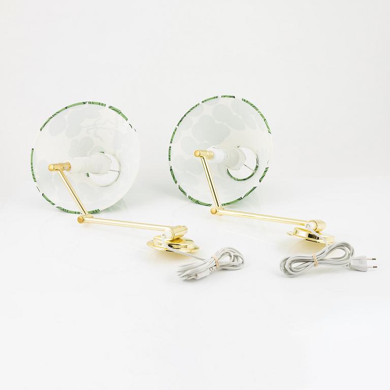 A pair of brass wall lights, later part of the 20th Century.