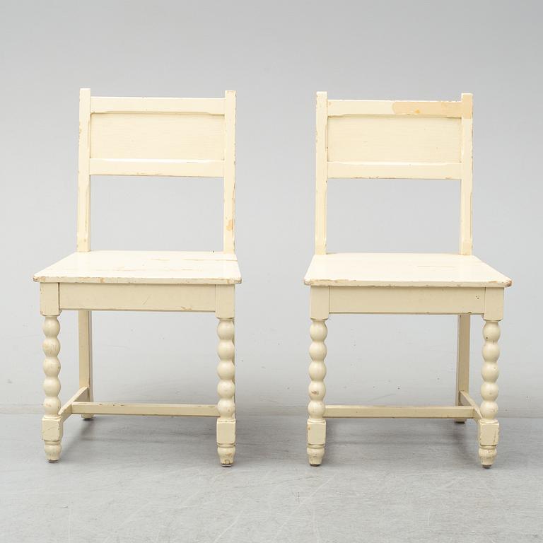 A set of table and two chairs, baroque-style, 20th century.