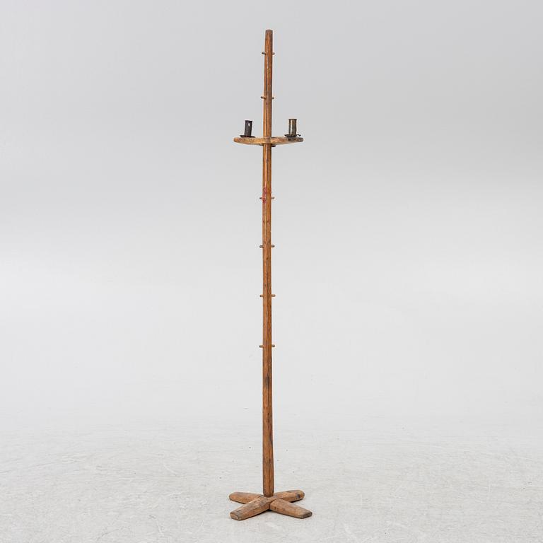 A floor candlestick, 19th Century.