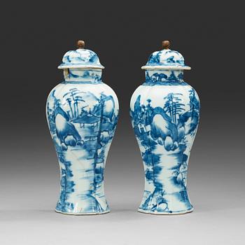 A pair of blue and white vases with covers, Qing dynasty, Kangxi (1662-1722).