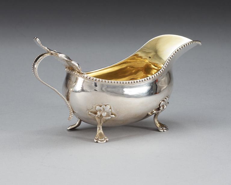 A Swedish 18th century parcel-gilt cream jug, makers mark of Peter Johan Zetterling, Linköping 1789.