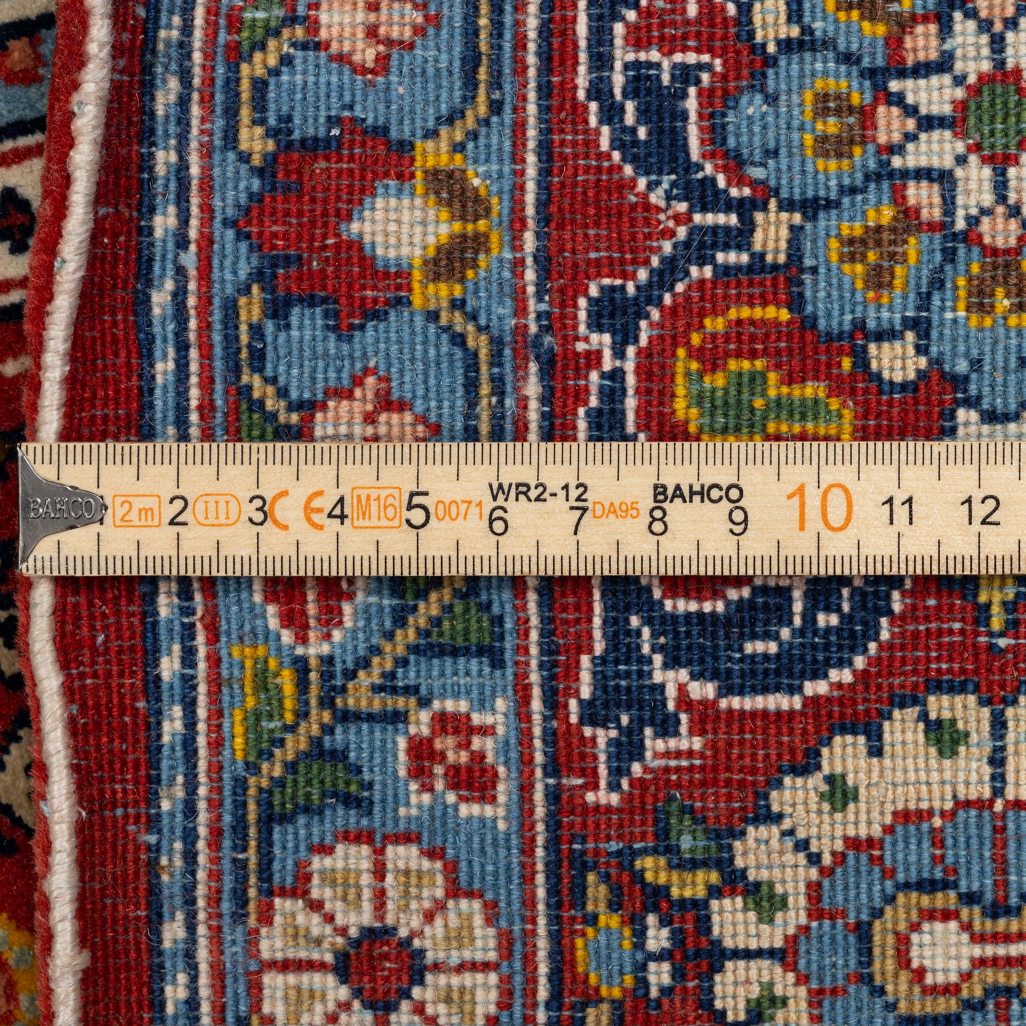 A Gohm rug, c. 225 x 145 cm.