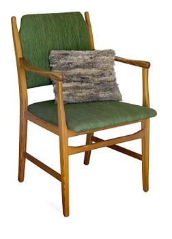 121. A PINE ARMCHAIR,