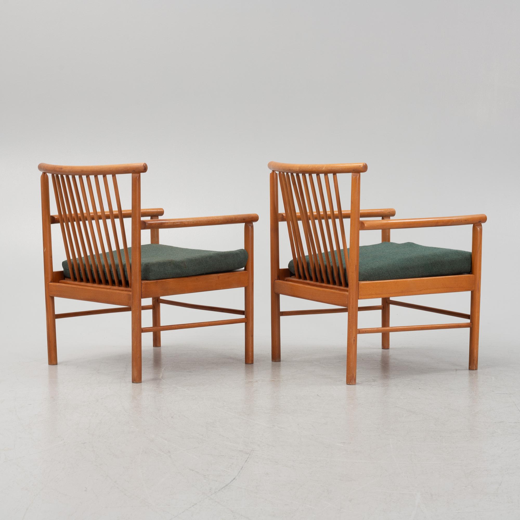 A pair of armchairs, mid 20th Century.